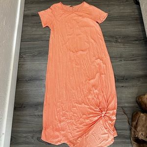 Peach short sleeve maxi dress tied at the ankle soft stretchy material